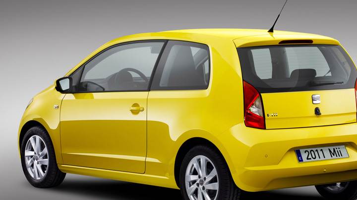 2012 SEAT Mii Side Back Pose In Yellow